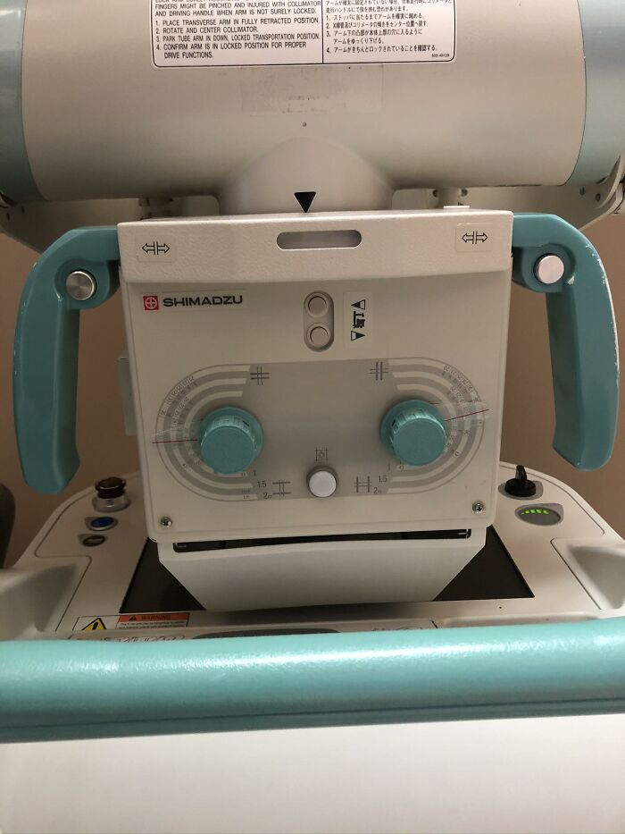 Medical device control panel with knobs and handles resembling a face, an example of random objects that look like faces.