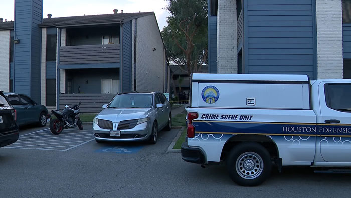 Crime scene unit vehicle parked outside a residential building linked to hungry and thirsty toddlers asking for food.