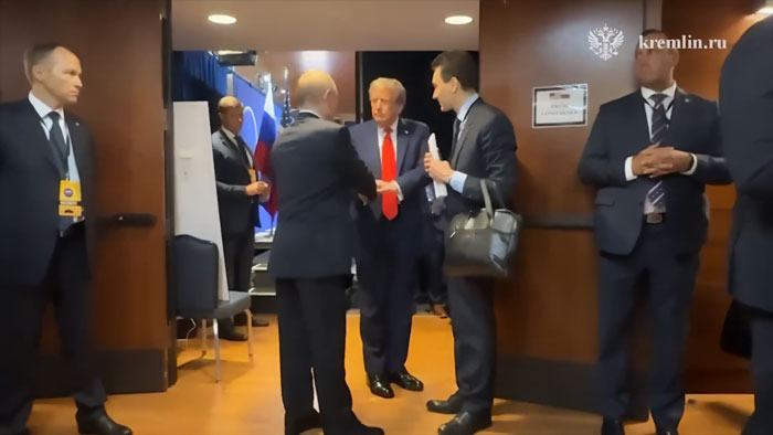 Putin with a twitching leg in Alaska meeting with Trump, sparking rumors of an exoskeleton device.
