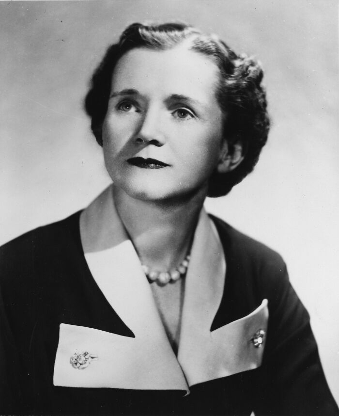 Black and white portrait of a woman scientist wearing a pearl necklace and formal attire, featured in Smithsonian portraits.