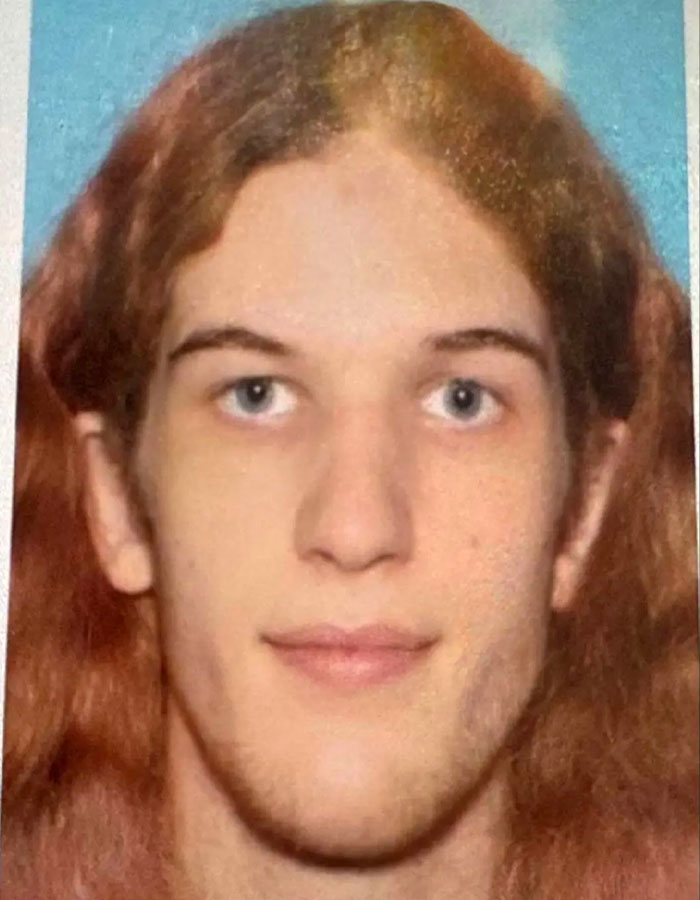 Close-up of a young man with long red hair, linked to Minneapolis Catholic school suspect and psychotic obsession video. Close-up of a young man with long red hair, linked to Minneapolis Catholic school suspect and psychotic obsession video.