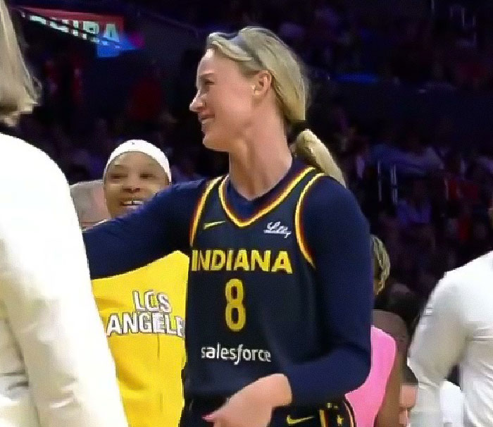 WNBA star in Indiana jersey smiling during game after viral footage of flying dildo hitting her sparks reactions. WNBA star in Indiana jersey smiling during game after viral footage of flying dildo hitting her sparks reactions.