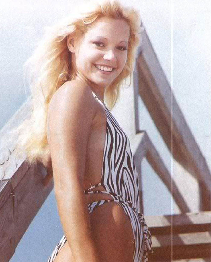 Young woman in a zebra print swimsuit smiling outdoors, featured among celebrities and important figures with unsolved disappearances.