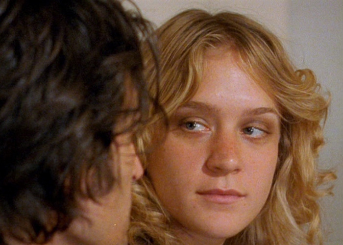 Close-up of two movie stars in an intimate scene, highlighting moments from love-making scenes during filming.