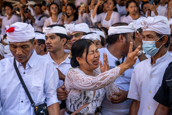 Group of people dressed in traditional attire during a cultural event, capturing the beauty of cultures worldwide.
