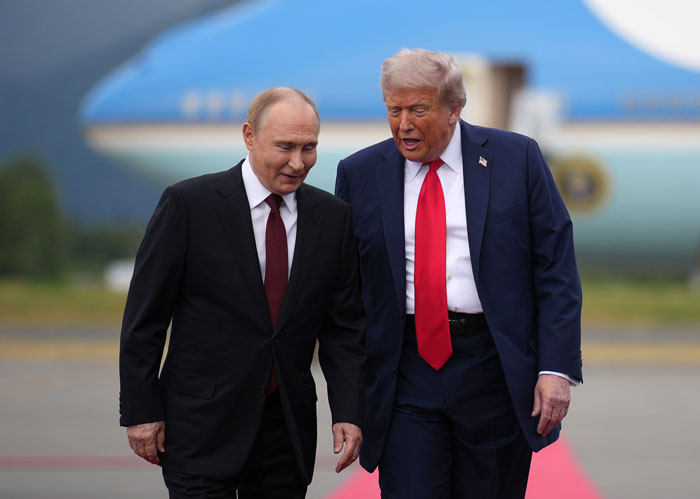 Trump and Putin's Awkward 'Yanking' Handshake Goes Viral Amid Historic Meeting As Body Language Expert Reveals Significance