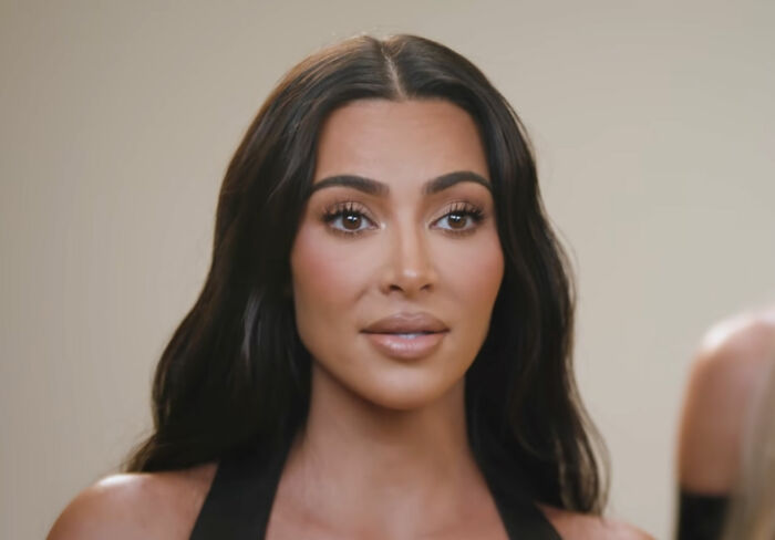 Close-up of a female celebrity with long dark hair showing how out-of-touch celebrities appear while trying to be relatable