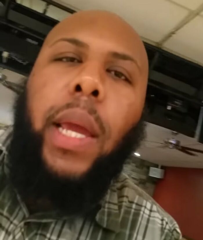 Close-up of a man with a beard speaking indoors, one of 42 videos that don’t seem anything special without context. - 34