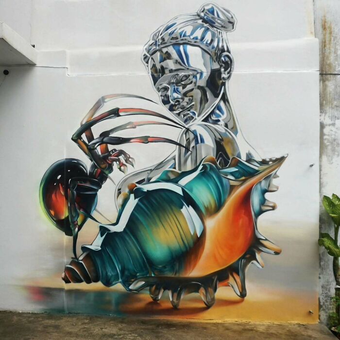 Colorful mural blending realism and abstraction, featuring a reflective figure and a surreal shell, showcasing graffiti art style.