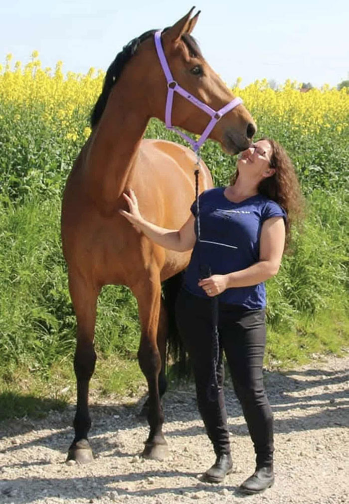 Woman with pony outside in field, relating to donating her daughter&rsquo;s pony to zoo to be eaten by lions controversy.