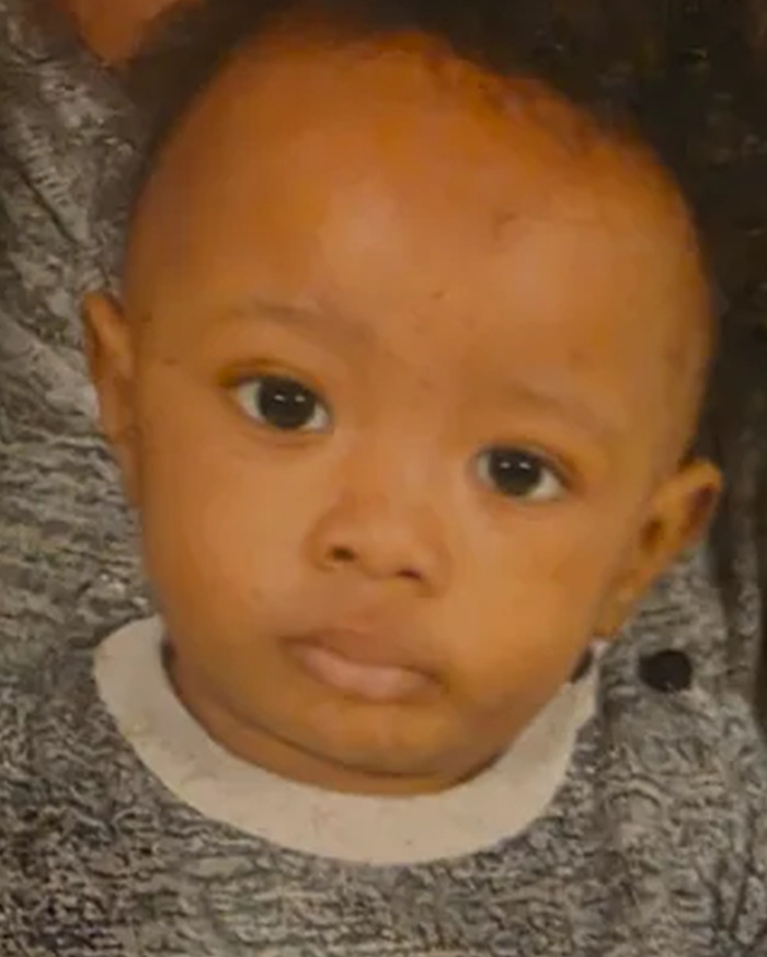 Close-up of toddler with serious expression highlighting crucial signs ignored in vegan diet case.