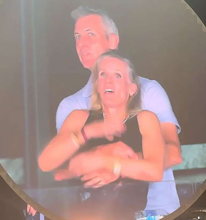 Adult star Sophie Rain and Coldplay Kiss Cam CEO Andy Byron embracing during a public event at night. Adult star Sophie Rain and Coldplay Kiss Cam CEO Andy Byron embracing during a public event at night.