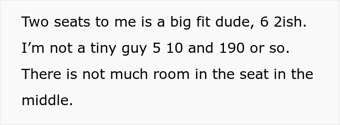 Man standing up to train bully who is huffing and puffing after not getting his way on crowded train.