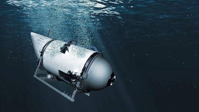 Underwater exploration vehicle submerged in deep ocean, highlighting biggest world unexpected discoveries in marine research.