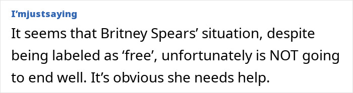 Britney Spears in a gold minidress experiencing a nip slip during a raunchy dance performance on stage.