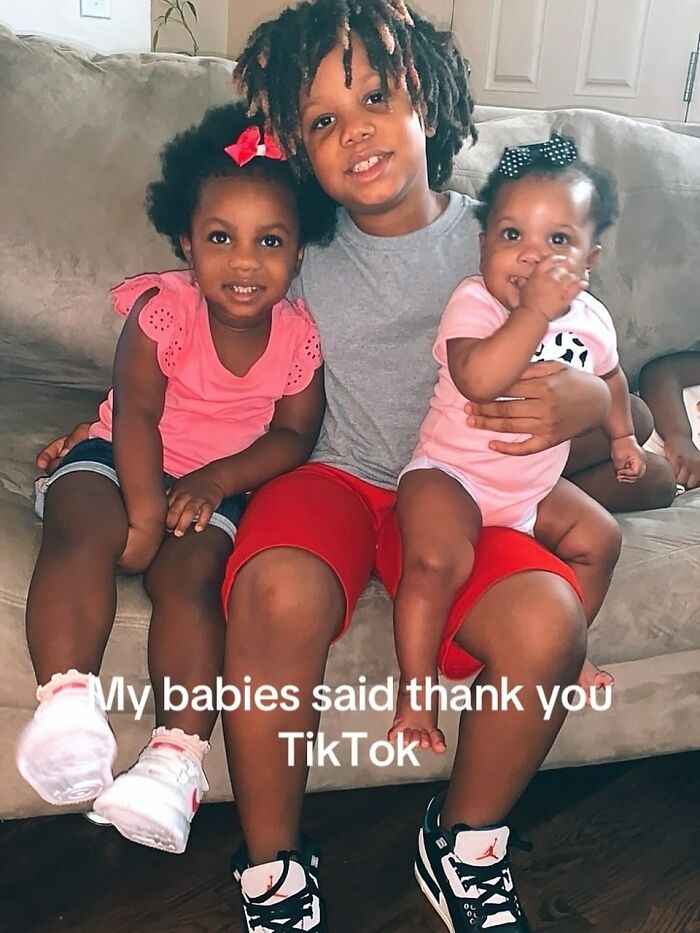 Three young children sitting on a couch, representing a Burger King employee&rsquo;s emotional life update after viral performance.