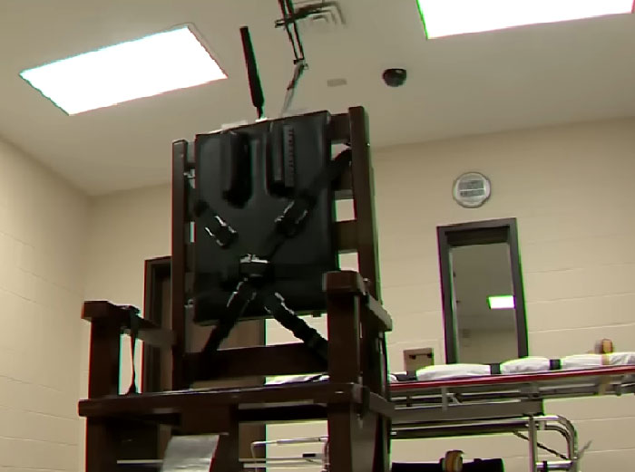 Execution chamber with wooden electric chair and medical stretcher in a sterile beige room during prison procedure - 5