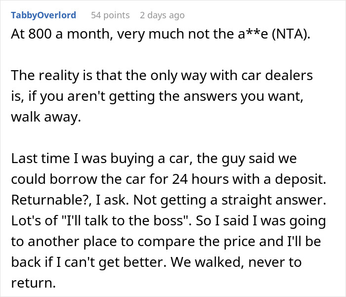 Man drags wife out of car dealership before she can show him the car she wants during tense car buying moment.