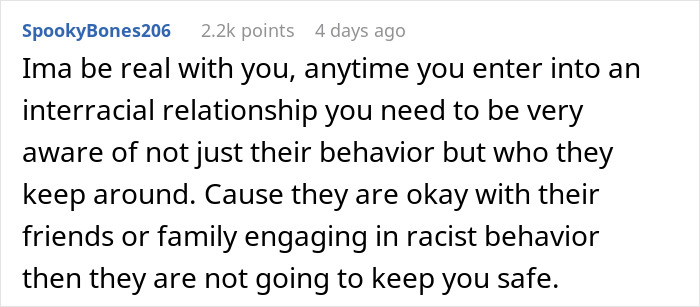 Screenshot of a forum comment discussing trust and behavior in interracial relationships after a jealous phone check.