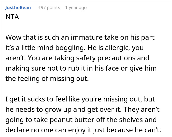Screenshot of a Reddit comment discussing a man upset his girlfriend bought a peanut butter cake for work.