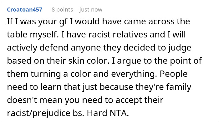 Comment discussing defending against racist relatives during a chaotic dinner involving racial insults and emotional distress.