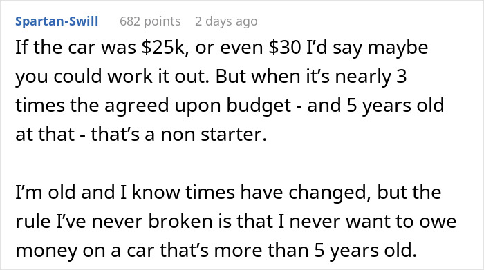 Couple at car dealership with husband dragging wife outside, not giving her a chance to show the car she wants.