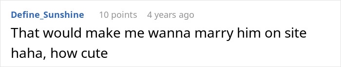 Man feeding kitten in subway station, showing kindness and care in an urban setting.