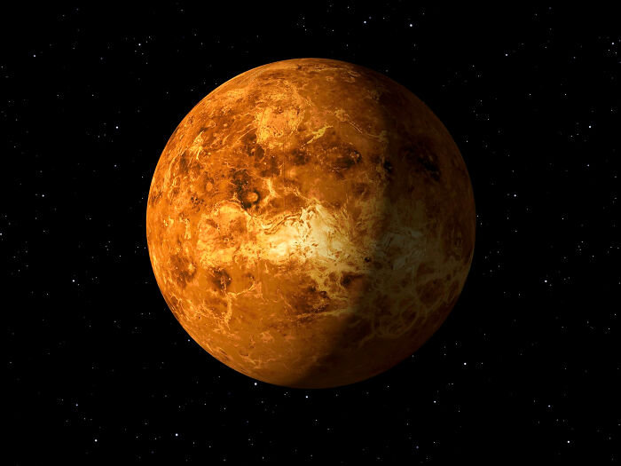 Planet Venus shown against a starry background illustrating concept time facts about planetary rotation.