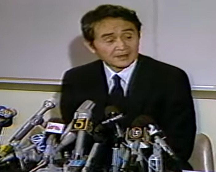 Coroner speaking at a press conference revealing suspicious Marilyn Monroe autopsy findings 60 years later. - 11