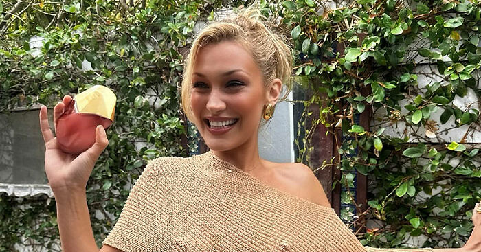Bella Hadid’s Daring Braless Look For New Perfume Launch Slammed By Critics