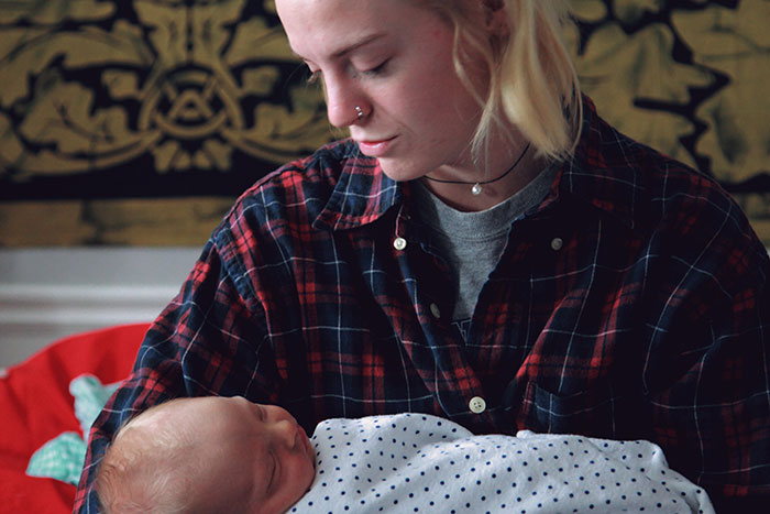 Teen daughter held gently by a woman, illustrating emotional impact of dad calling CPS in a difficult family situation.