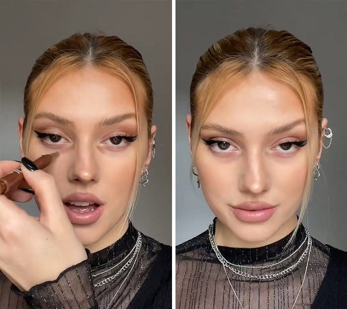 Young woman demonstrating the "tired girl" beauty trend makeup look with winged eyeliner and subtle contouring on face.
