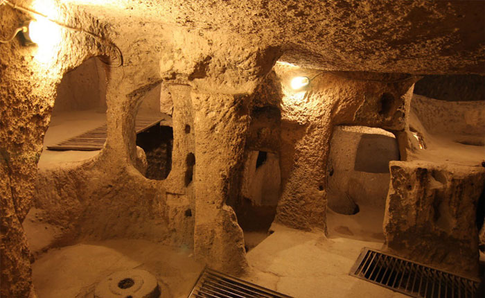 Ancient mysterious underground city carved into rock, featuring multiple chambers and passageways 18 stories deep and 280 feet underground.