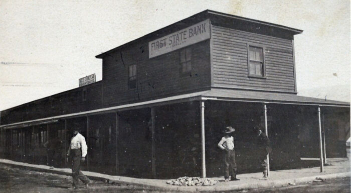 Early historic black and white photo of the First State Bank building, capturing the birth of Vegas architecture and development.