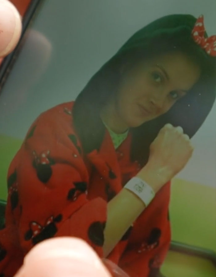 Young woman showing hospital wristband, symbolizing rare disorder diagnosis after years of dismissed pain and medical scans. Young woman showing hospital wristband, symbolizing rare disorder diagnosis after years of dismissed pain and medical scans.
