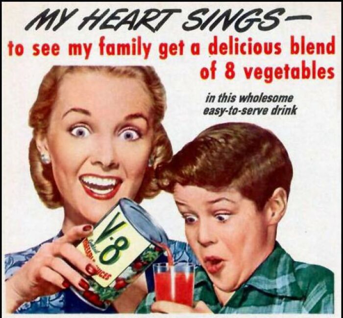 Vintage advertisement showing a woman pouring V8 vegetable juice for an excited young boy, reflecting vintage advertisements style.