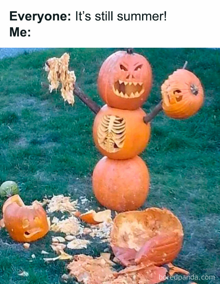 Pumpkin snowman with angry face holding a carved pumpkin head and pumpkin guts, funny creepy Halloween meme outdoors.