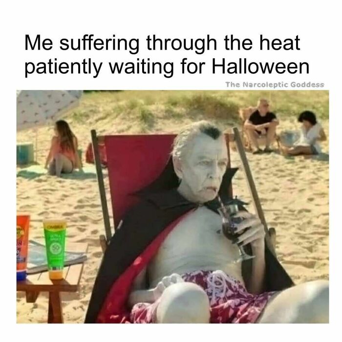 Man in vampire costume sitting on beach chair drinking wine, creepy funny meme about waiting for Halloween humor black