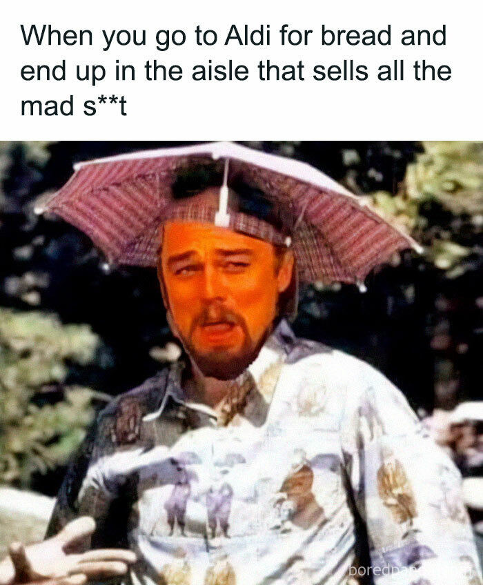 Man with facial expression of confusion wearing a hat-umbrella combo in a chaotic British memes style.