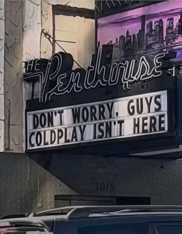 Marquee sign at The Penthouse theater with a funny message, reflecting chaotic marriage memes humor and relatable humor.
