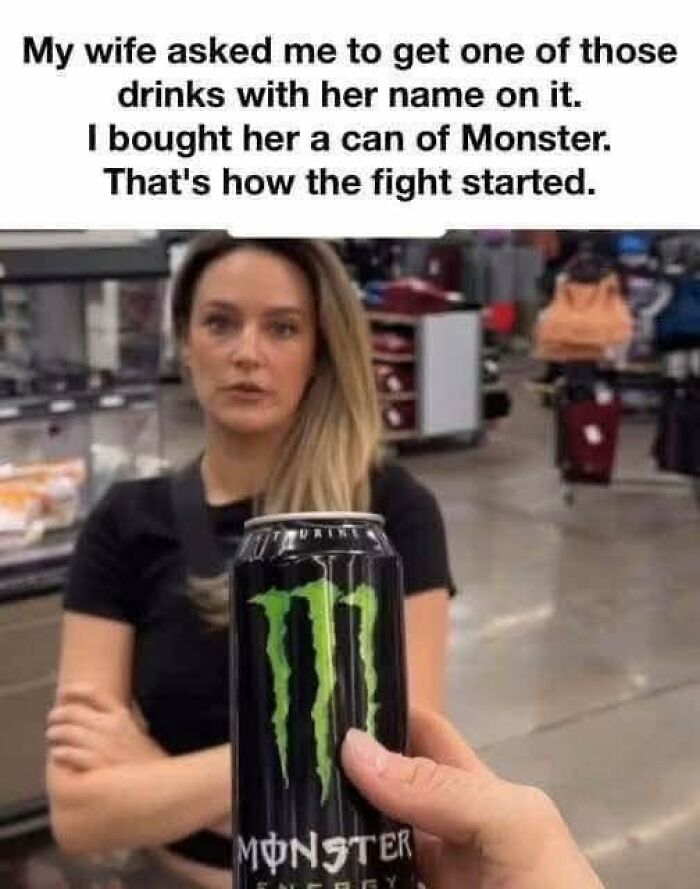 Woman looking annoyed in a store while a hand holds a can of Monster energy drink, illustrating funny chaotic marriage memes.
