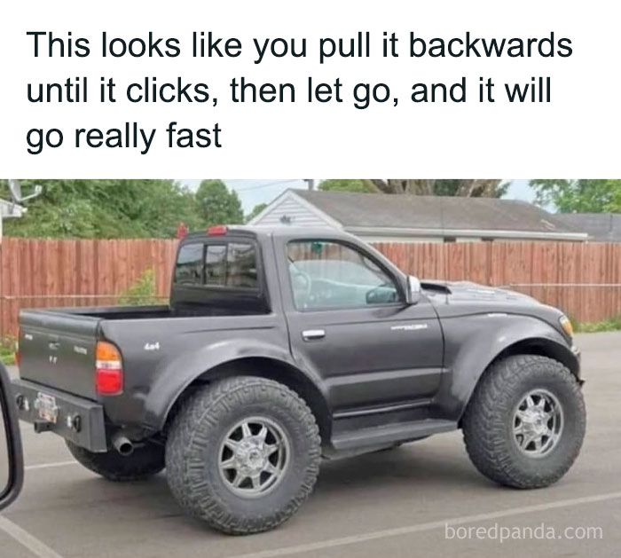 Grey pickup truck with oversized tires parked in a lot, part of entertaining posts and memes to help fight boredom.