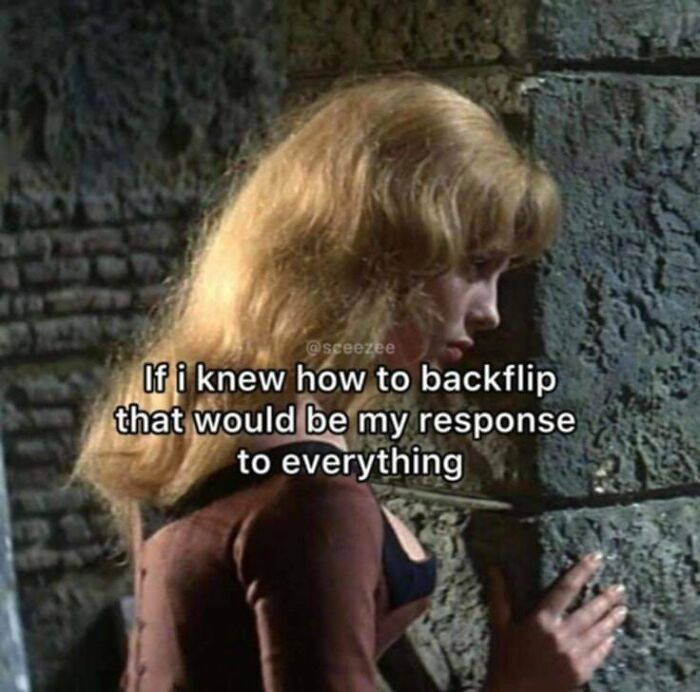 Woman with blonde hair leaning against a stone wall with text about backflips, relatable to neurodivergent people memes.