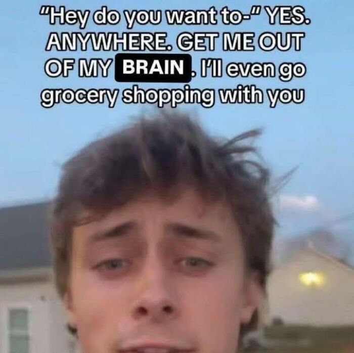 Young man with messy hair and a humorous caption about wanting to escape his brain, relatable to neurodivergent people.
