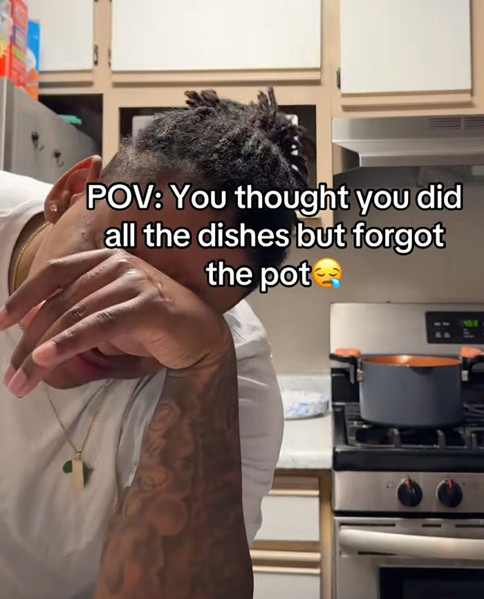 Man in kitchen with hand on face next to stove showing relatable meme about forgetting to wash a pot among hilarious memes