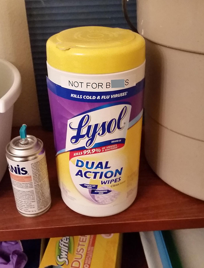 Container of Lysol dual action wipes with a humorous label showing a funny way people learned their lesson.