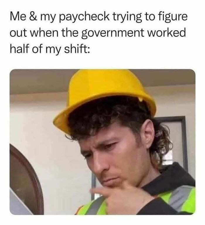 Man in a yellow hard hat and safety vest looking confused, illustrating a work meme about paycheck frustration.