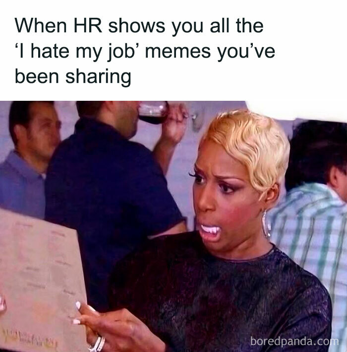Woman with short blonde hair looking shocked at a document, illustrating work memes for everyone ready to retire.