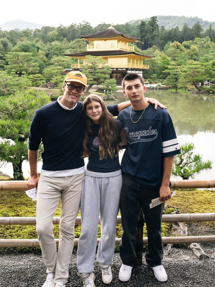 Tom Brady with his children at a scenic location, highlighting parenting tensions with Gisele B&uuml;ndchen.