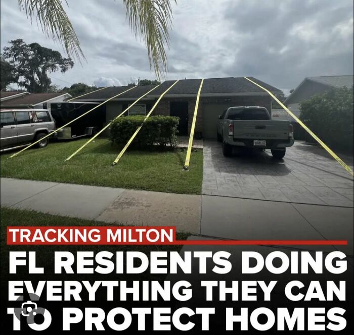 House with yellow straps securing the roof as Florida residents protect homes during severe weather season.